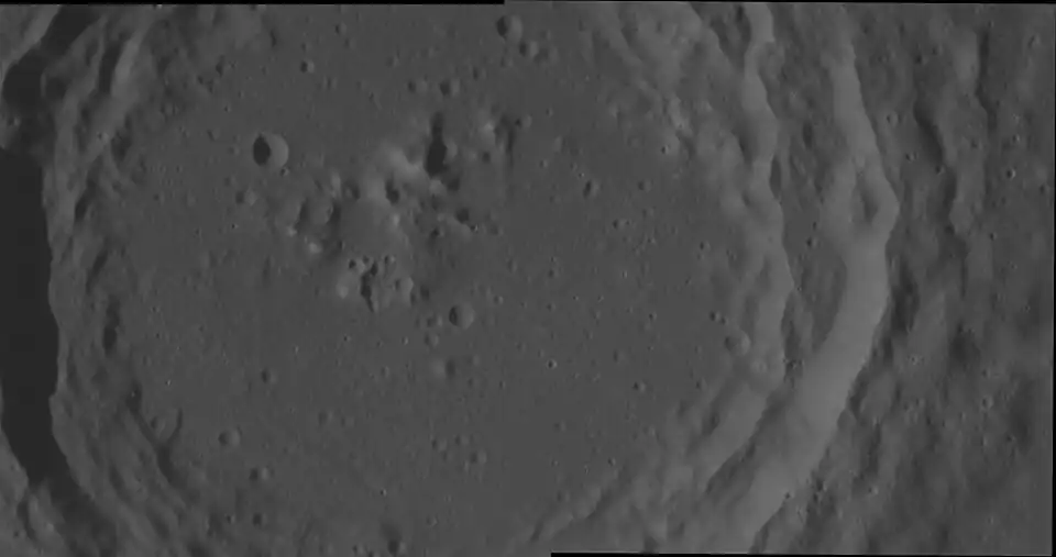 Mosaic of MESSENGER NAC images. Some hollows are visible on the central peak complex.