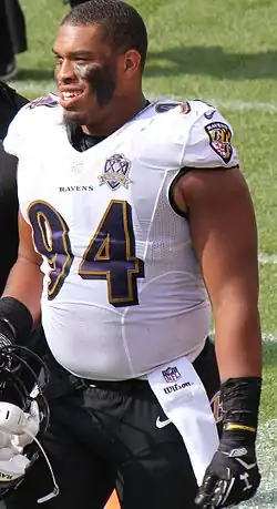 A photo showing Davis in a Baltimore Ravens football uniform