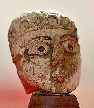 Assyrian rosettes on an ivory piece from Nimrud, 9th to 7th century BC, ivory, Iraq Museum, Baghdad