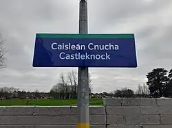 Bilingual sign at Castleknock train station