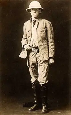A man in safari gear in the early 1900s