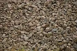 Irregularly cut brown stones with edges