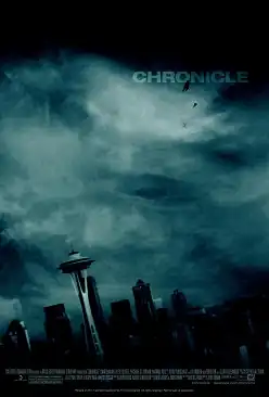 In front of a cloudy sky, three silhouettes of young men float high above Seattle, Washington.