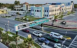 Photo of Main Street & US-19 showcasing the Historic Downtown New Port Richey sign.