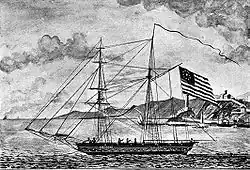 sailing ship with US flag