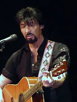 Gregory performing in 2013