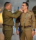 Chetboun receiving the Aluf Mishne rank from Eyal Zamir, 2025