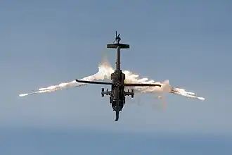 Colombian Aerospace Force Sikorsky UH-60L Arpía III (S-70A-41) just after having launched several flares.