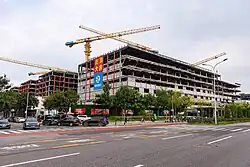 Topping out of Xibeiwang MIXC in Beijing, China with celebration banners (2021)