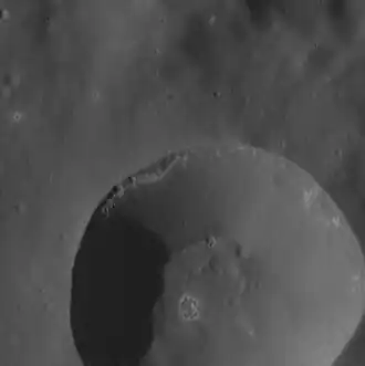 Close up of 12 km diameter crater with hollows in the southern half of Jobim