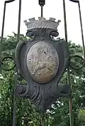 Crest of the Singapore Municipal Commission on the gate of the former Bidadari Cemetery