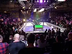 image of snooker table and crowd