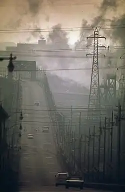 Dark factory clouds obscure the Clark Avenue Bridge in Cleveland, Ohio, July 1973.