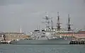 Mitscher at Portsmouth in October 2008 with the masts of HMS Victory in the background.