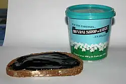 Sirop de Liège/Luikse siroop on a slice of bread