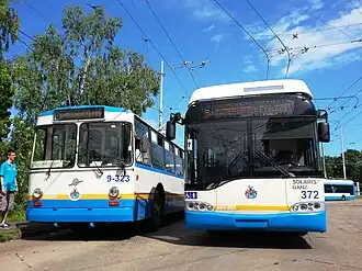 ZiU-9 9-323 and Ganz-Solaris Trollino 12 372 at Segner square