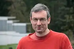 Wide headshot of Dennis Gaitsgory outdoors