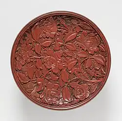 Carved lacquer tray with roses, Yuan dynasty, 16 cm across
