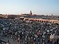 Jamaa el Fna in the evening, looking toward Café Argana and the covered souq.
