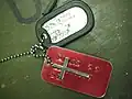 Military ID tag, with a cross on the chain, but with a designation: no preference