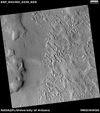 Wide view showing ribbed terrain and brain terrain, as seen by HiRISE under HiWish program