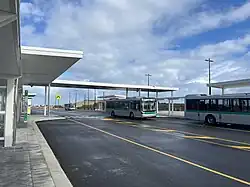 Buses on a bus interchange road