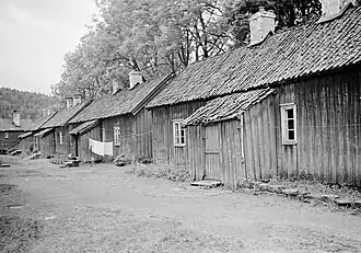 Road with houses at the Eikeland verk in 1939