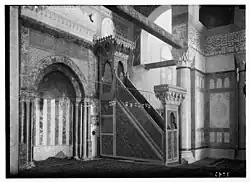 The original minbar installed under Saladin. The mihrab is visible to the left.