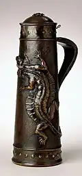 Elizabeth Söderberg (c.1906) Tankard with frilled lizard, insect and gumleaf design, pewter