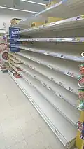 Empty shelves of canned meat and other food in Tesco, Prague, on 27 February 2020