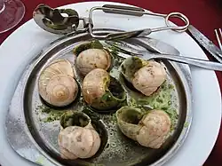 Escargots, with special tongs and fork