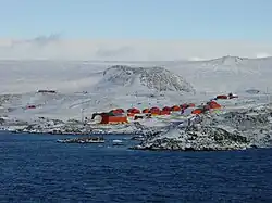 The station is the building atop on the left