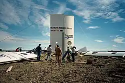 The first set of the station's wall panels are erected on July 20, 2000.