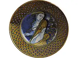 Woman with a viol dish, earthenware and metal lustre, Deruta (Italy), 16th century (on loan from the Louvre)