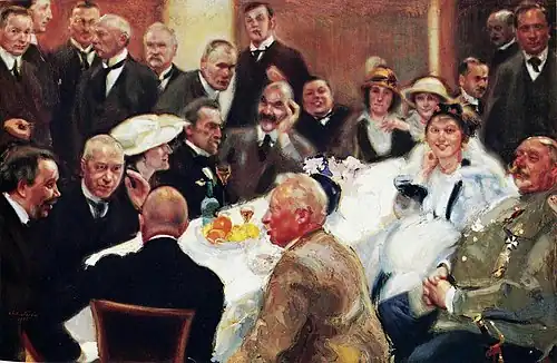 On the right at Akseli Gallen-Kallela's 50th birthday party, painting by Antti Favén [fi], 1915