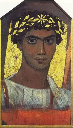 Mummy portrait of a young man with gilded crown
