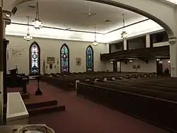 Pews, stained-glass windows and a choir loft