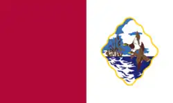 A flag with a red stripe to the left and a white stripe with a seal to the right