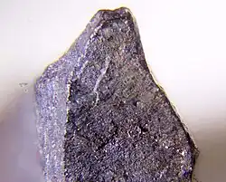 An image of a piece of fletcherite, a gray, metallic mineral
