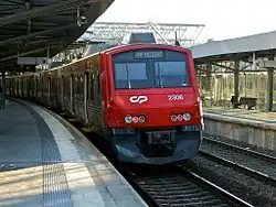 An urban service train leaving Track 2 of Sete Rios Station, July 2008