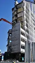 Hydraulic shears crush the facade of a building, March 21, 2025
