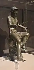 Bronze Fisherman with fountain spout