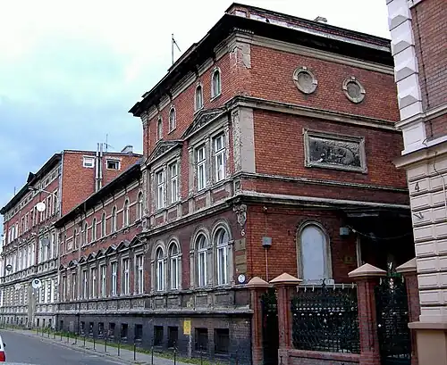 View from Czartoryskiego street, with the bas-relief on the right wall