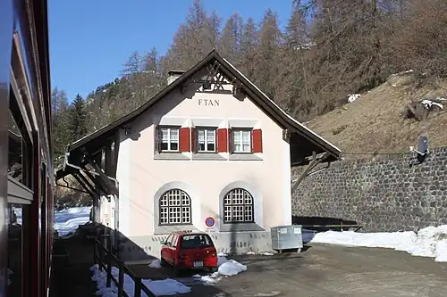 Two-story building with gabled roof