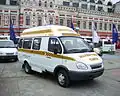 A white GAZ-322133 GAZelle taxi minibus