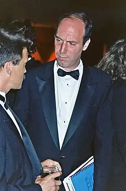 Gene Siskel, wearing a tuxedo, looking to his right.