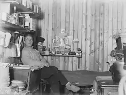 George Percy Abbott sitting on his bunk