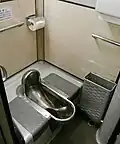 Squat toilet aboard a Japanese Ginga train