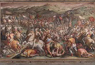 Giorgio Vasari (1511–1574) used earth colors, including ochre and sienna, in his frescos such this in the Hall of the Five Hundred at the Palazzo Vecchio in Florence.[13] In his writings Vasari referred to sienna as terra rossa.[14]