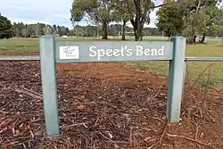 A sign marking the location of Speet's Bend. Many signs similar to this appear at various locations around the former circuit.
